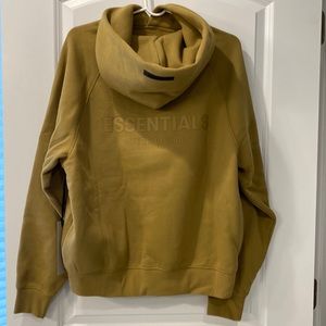 Brand new Essentials size XS hoodie. Color is like an olive tone